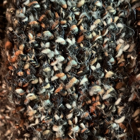 Multi-black sweater in XS but fits like a small or even medium. - Picture 2 of 4